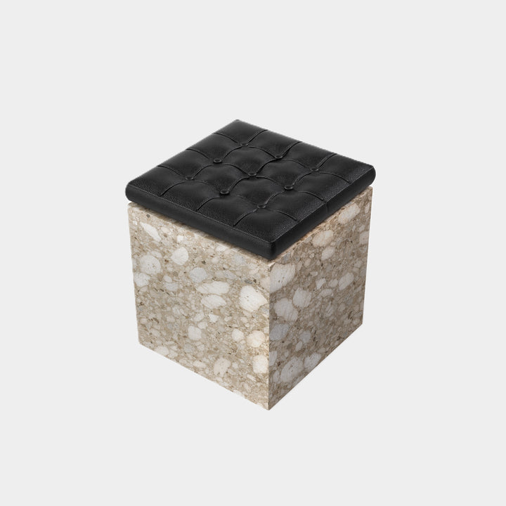Halden tufted leather marble ottoman side view in Beige Breccia