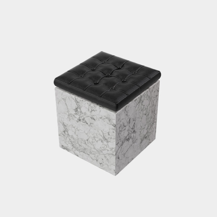 Halden tufted leather marble ottoman side view in White Carrara