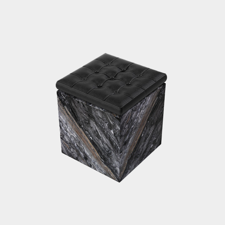 Halden tufted marble ottoman side view in Grey Galaxy