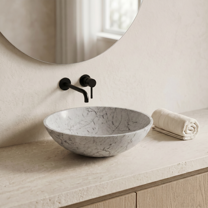 Round marble washbasin by Nordst — polished natural stone bathroom basin
