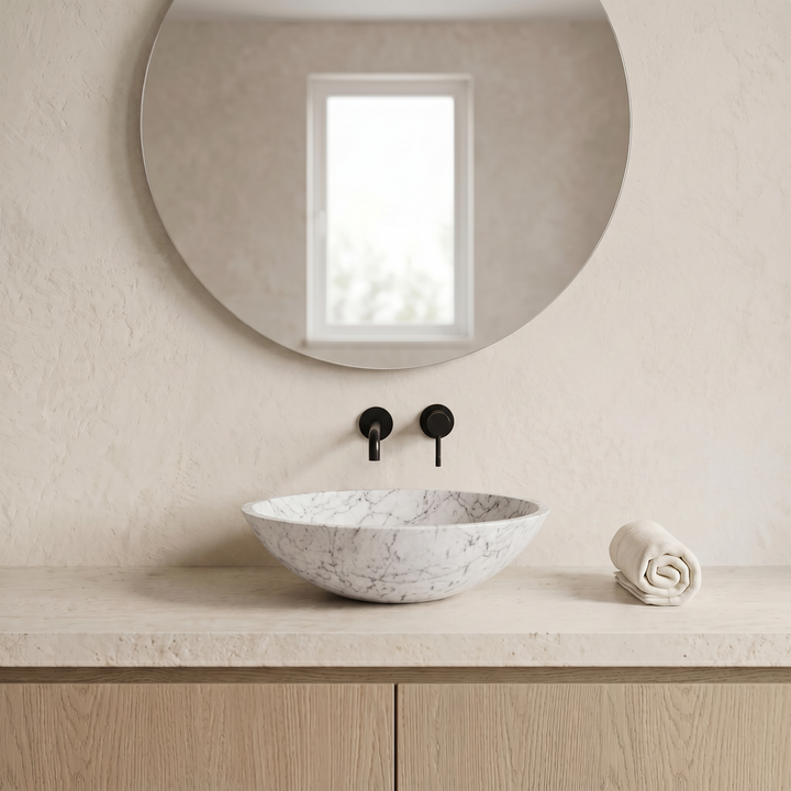 Round marble washbasin — front view of polished natural stone bathroom basin by Nordst