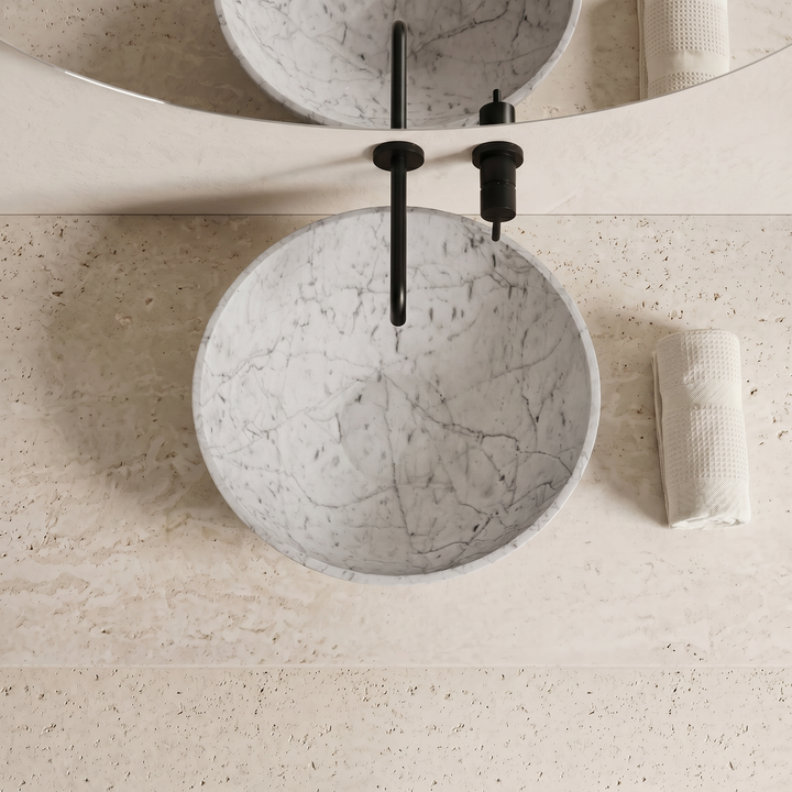 Round marble basin — top view showing polished interior bowl