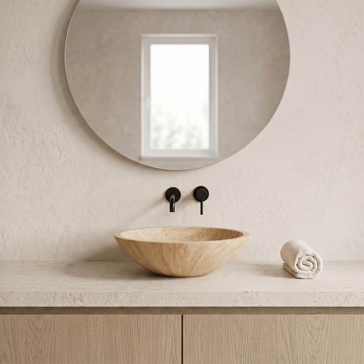 Beige travertine basin by Nordst, front view