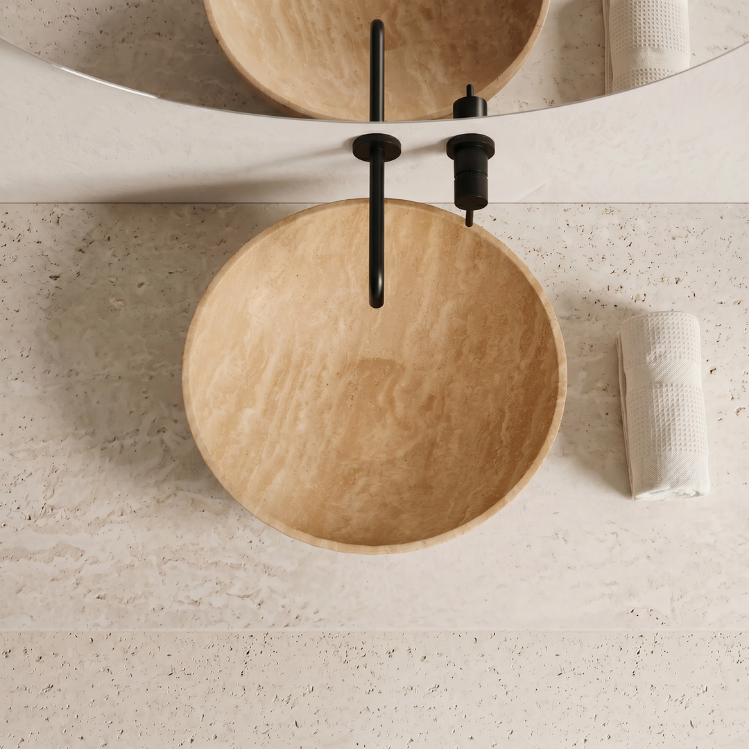 Beige travertine basin top view
