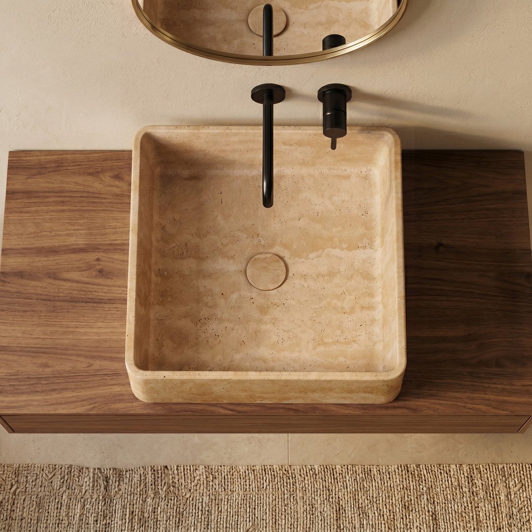 Beige travertine basin top view