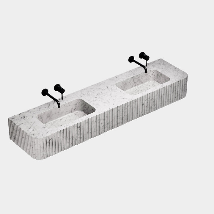 Raya ribbed double basin side view in White Carrara