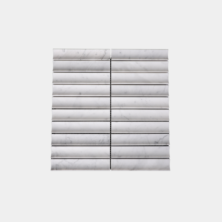 Inverted flute marble tiles flat lay view in White Carrara