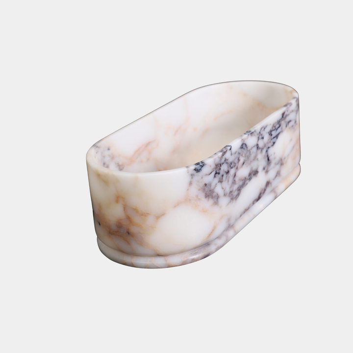 Leif oval marble bathtub angled view in Calacatta Viola