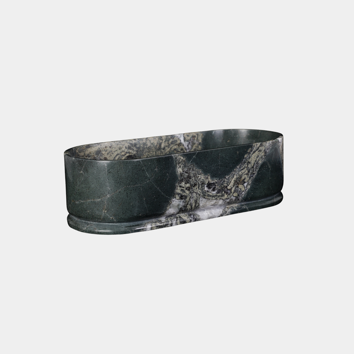 Leif oval bathtub side view in Emerald Green Quartzite