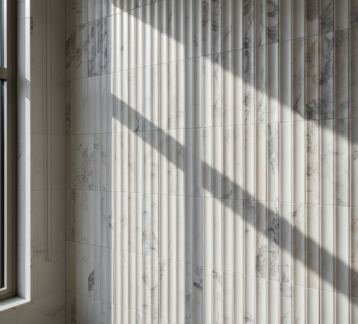Inverted flute marble tiles lifestyle view in Calacatta Viola